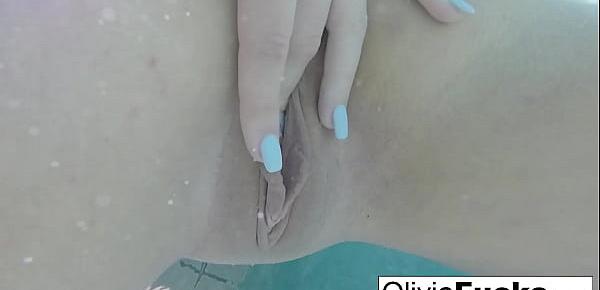  Horny Olivia plays with her pussy underwater